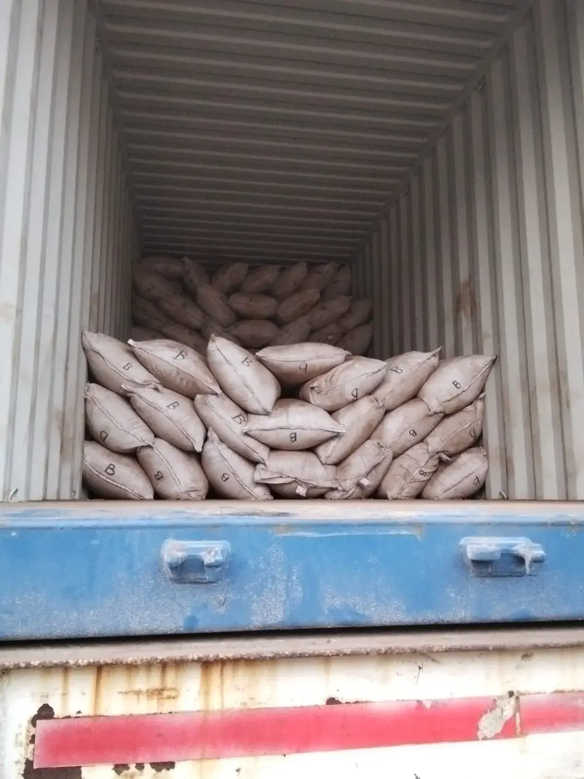 A part-loaded container seen from the trailer bed.